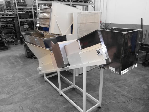 Elevadores y volteadores con detector de metales